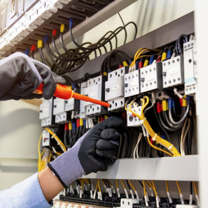 Electrical SuppliesElectrician working on fuse boxes
